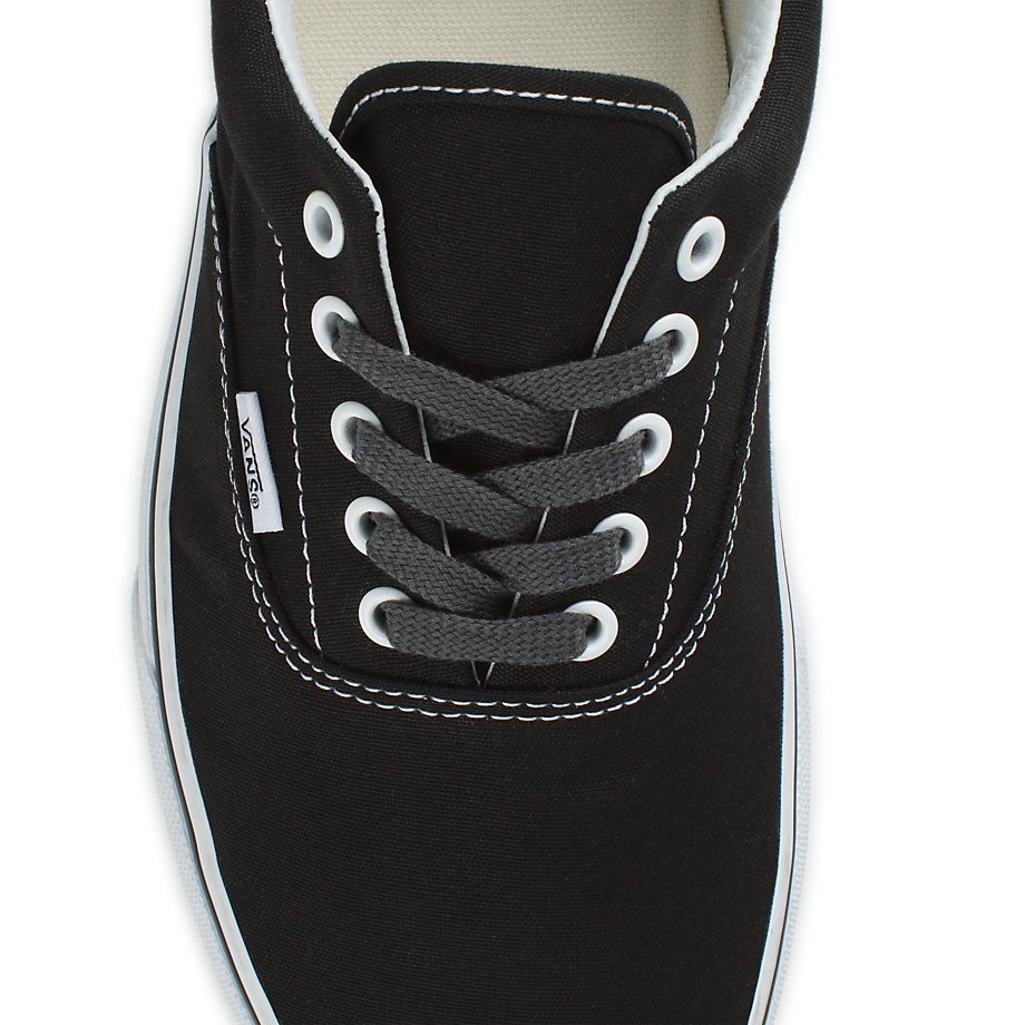black vans with brown laces