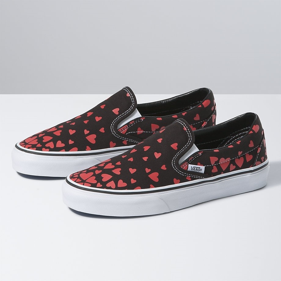 vans black and red slip on